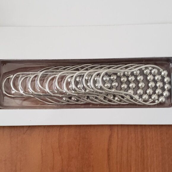 Shower curtain rings - still in the package - never used. - Picture 2 of 3